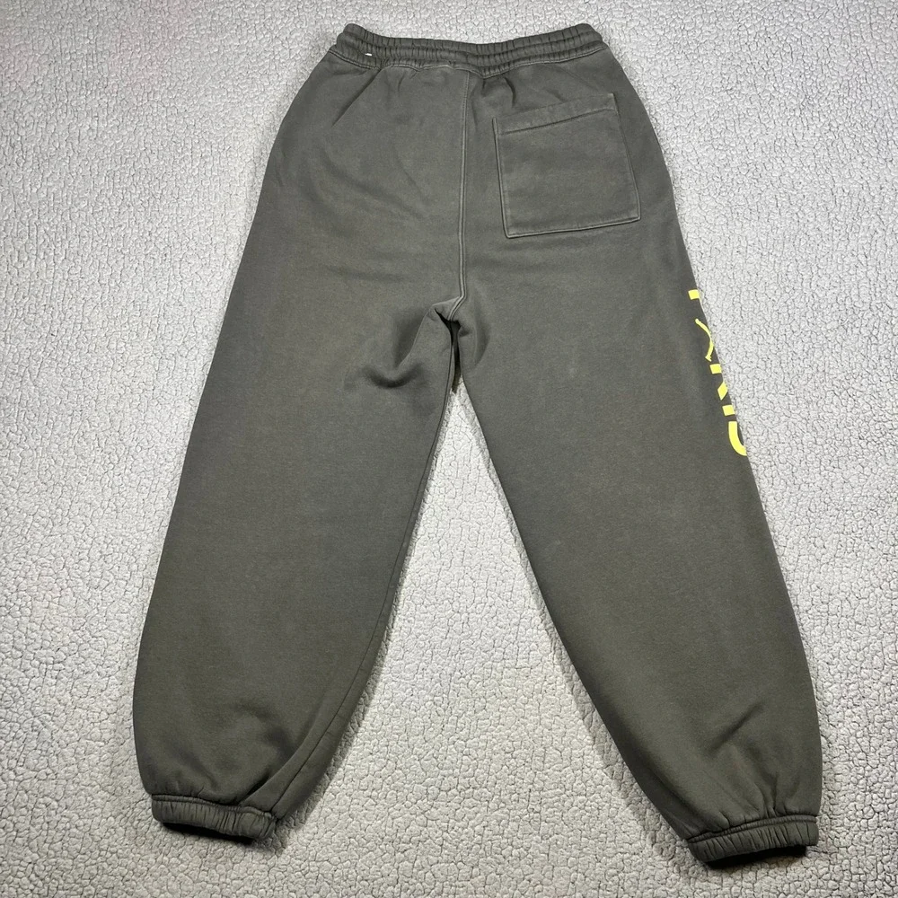 Jordan x PSG Paris Saint-Germain Fleece Sweatpants Mens Small Green Yellow Logo